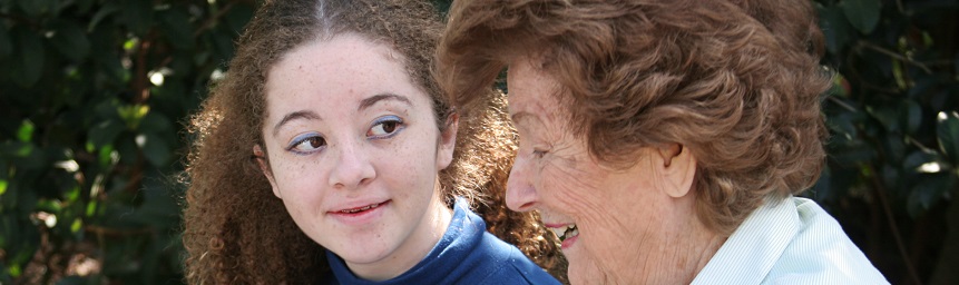 
A young person chatting to their grandparent