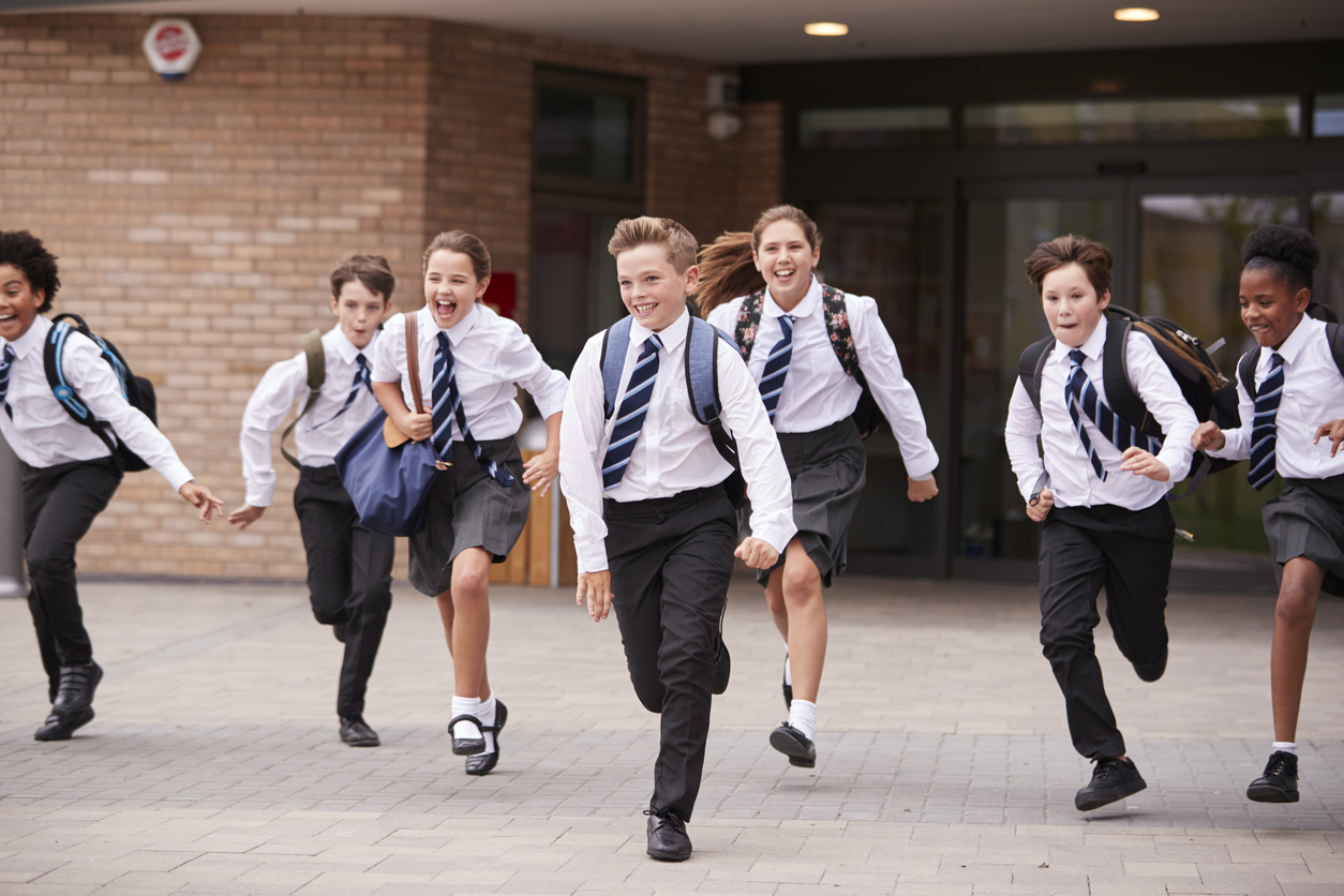 Schoolchildren running out of class