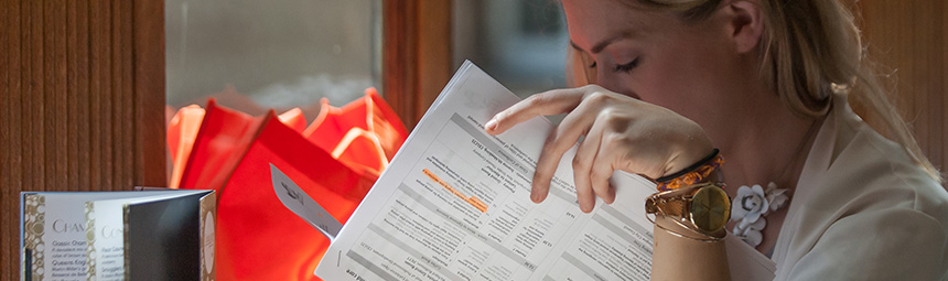 An office worker looking through paperwork