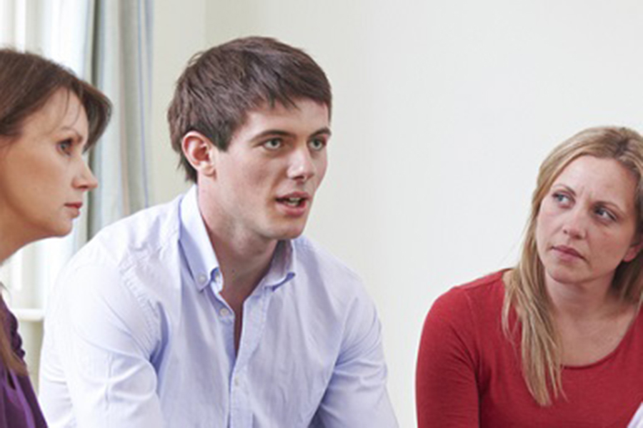 A man talking in a meeting