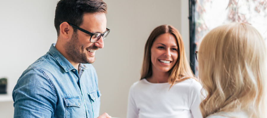 Office workers in conversation