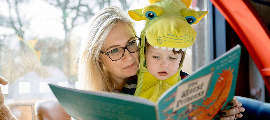 A parent reading with their child