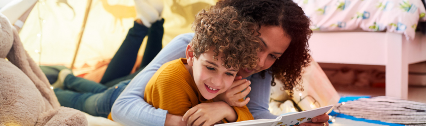 A parent reading with their child