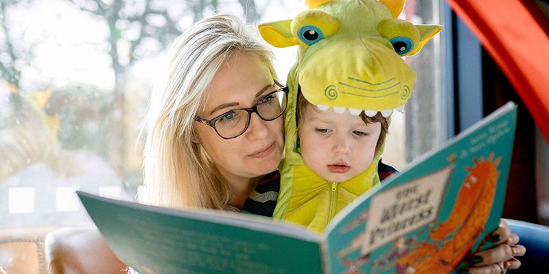 A parent reading with their child
