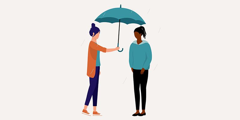 An illustration of two people sharing an umbrella