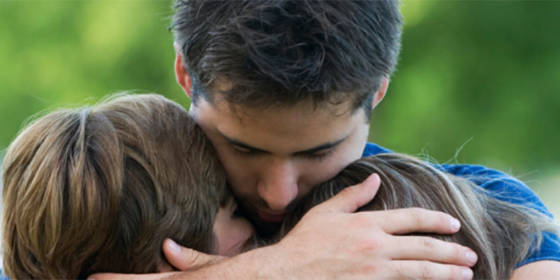 Father hugging a child