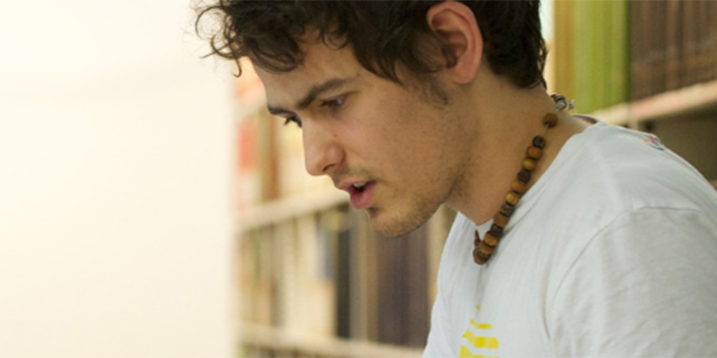 A man studying in a library