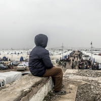 A refugee child in a transit camp