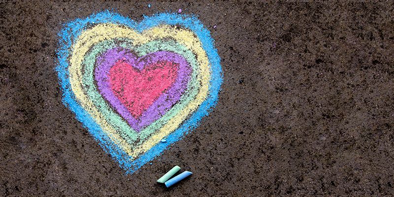 A heart chalked onto a pavement