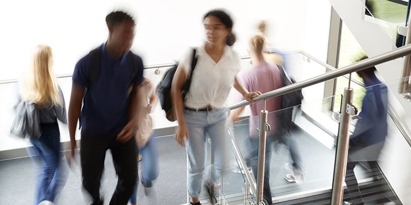 High school children on a staircase at school