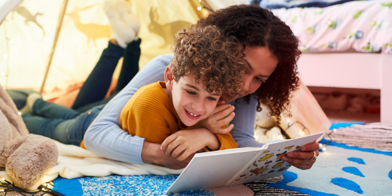 A parent reading with their child